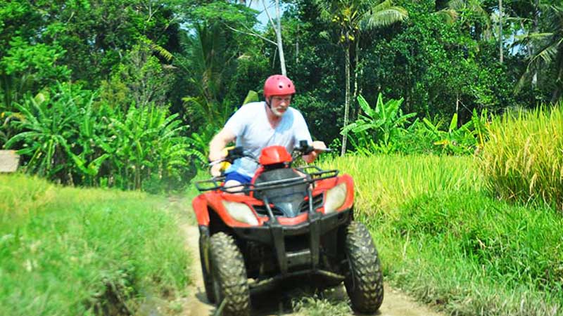 Ubud ATV Quad bike through river jungle waterfall rice fields
