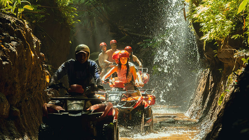 Ubud ATV Quad bike through river jungle waterfall rice fields